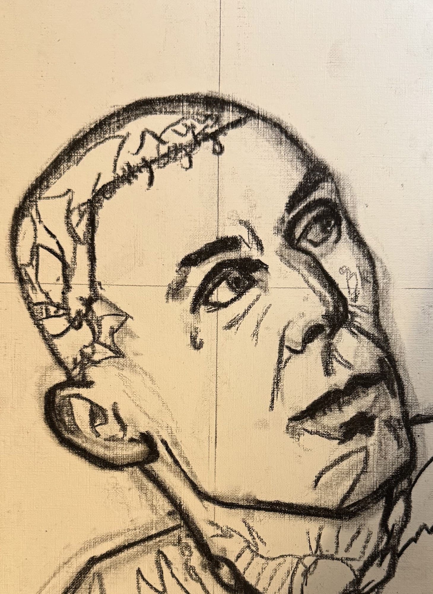 Charcoal-on-paper work-in-progress sketch of Travis Barker